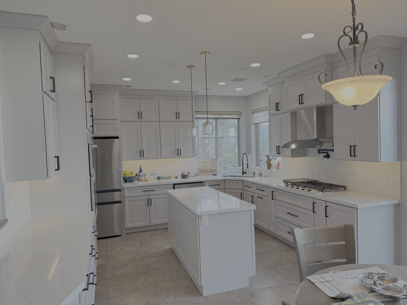 Kitchen remodeling in Prescott AZ featuring quartz countertops, cabinets and modern lighting